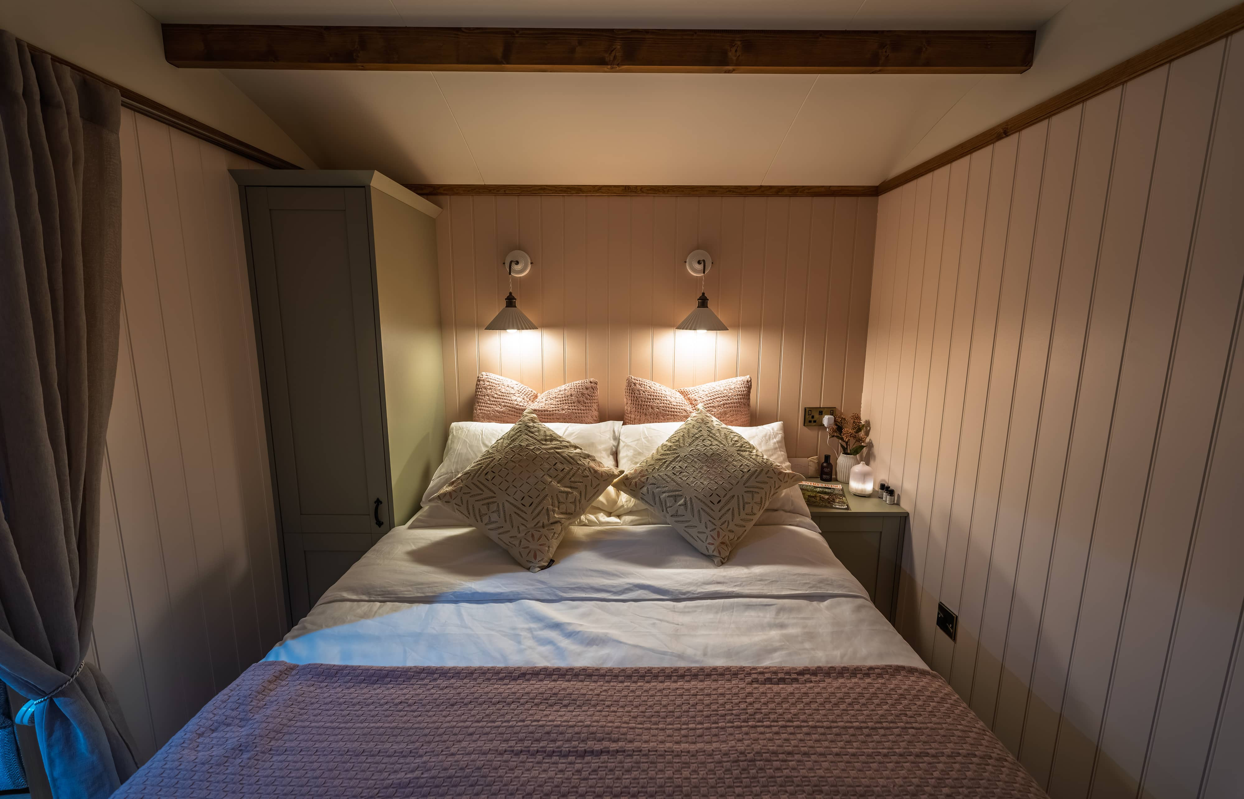 View looking straight at the king-size bed and wardrobe